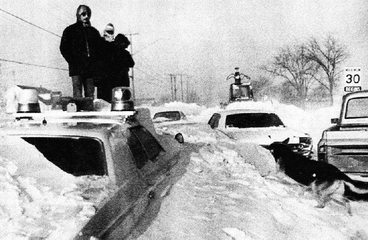 Buried cars, including a police car. Photo cred: Niagara Falls Public Library