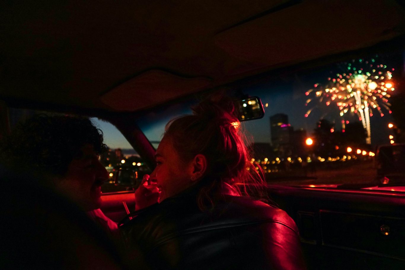 Couple in Car enjoying fireworks