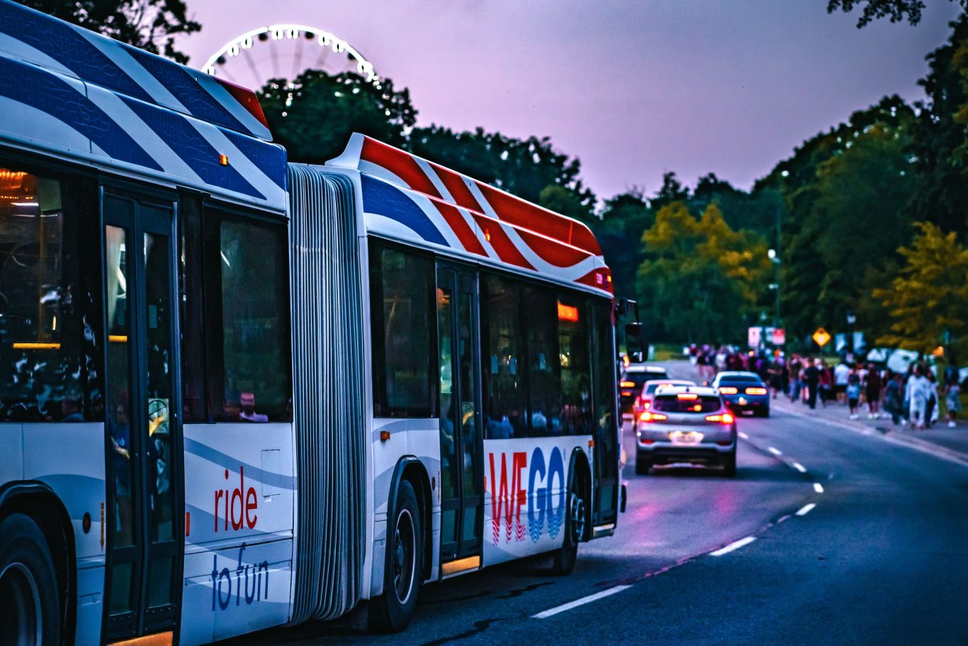 Wego Bus at Night on the Niagara Parkway with SkyWheel in background