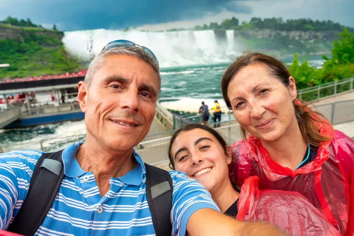 Happy family of caucasian people on holiday at Niagara Falls