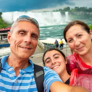 Happy family of caucasian people on holiday at Niagara Falls