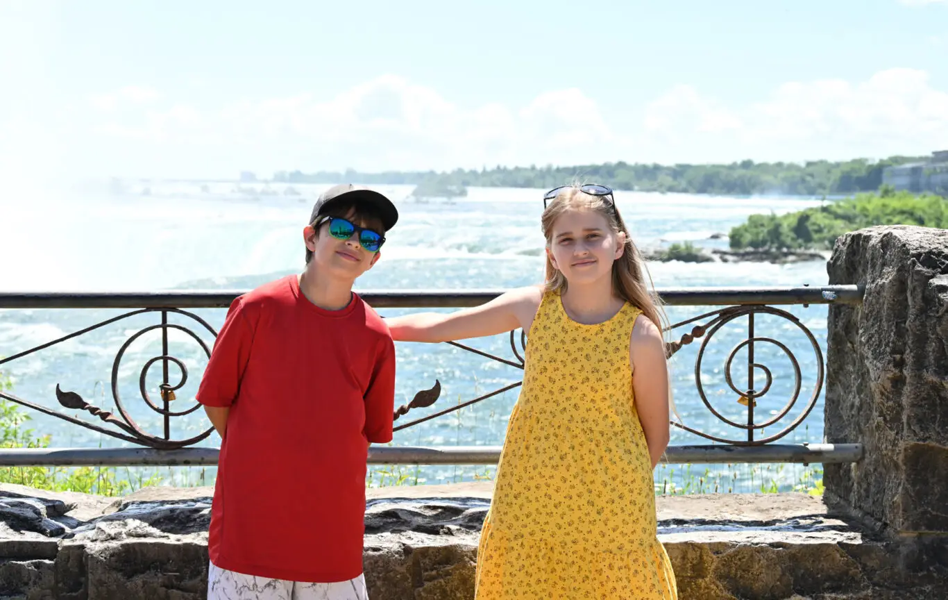 Quebec Holiday Family kids in front of the Falls