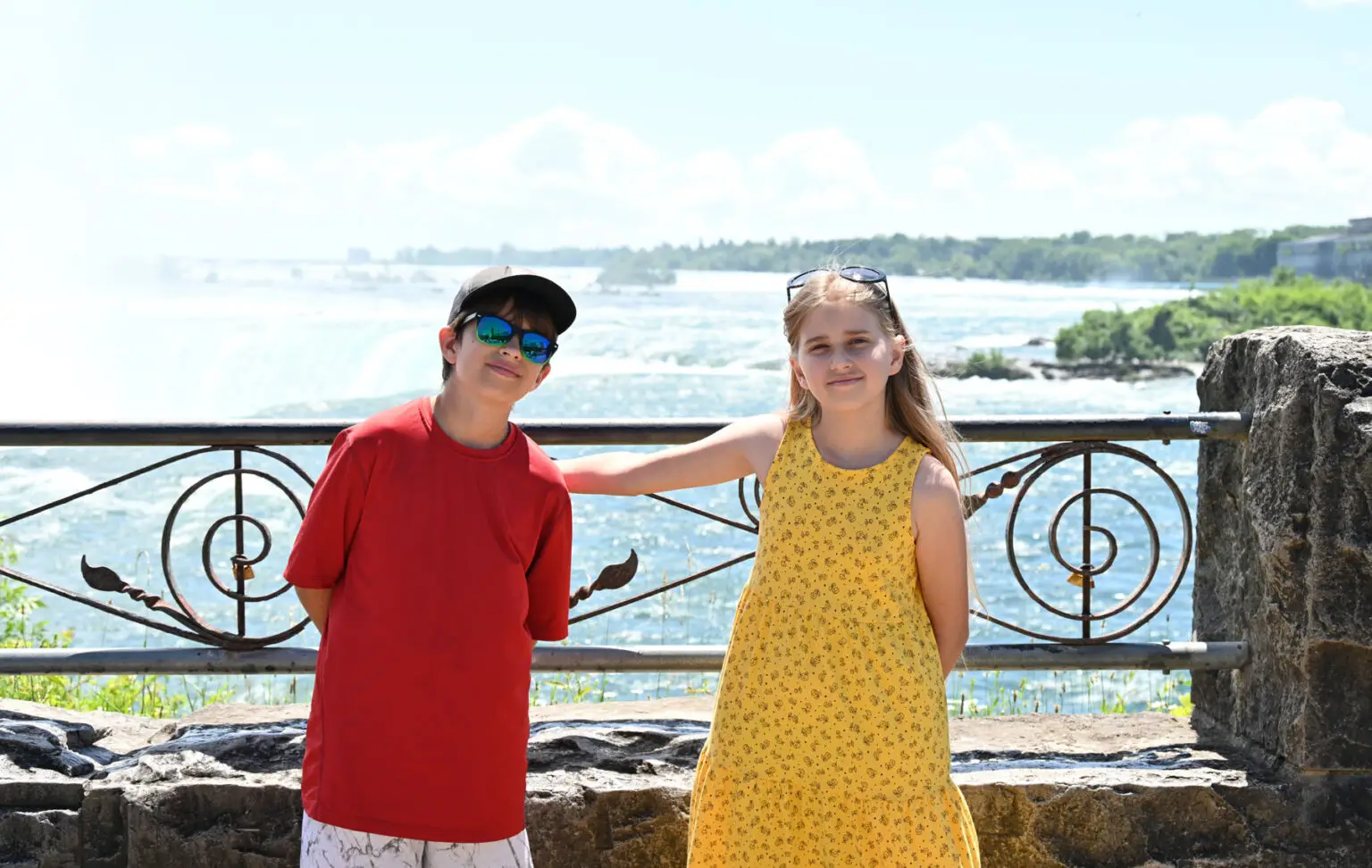 Quebec Holiday Family kids in front of the Falls