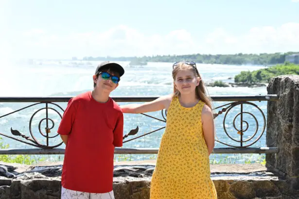 Quebec Holiday Family kids in front of the Falls