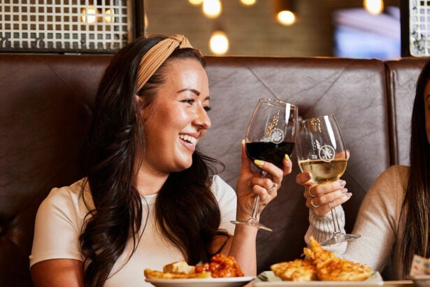 Kelsey's Restaurant with two Ladies eating and drinking
