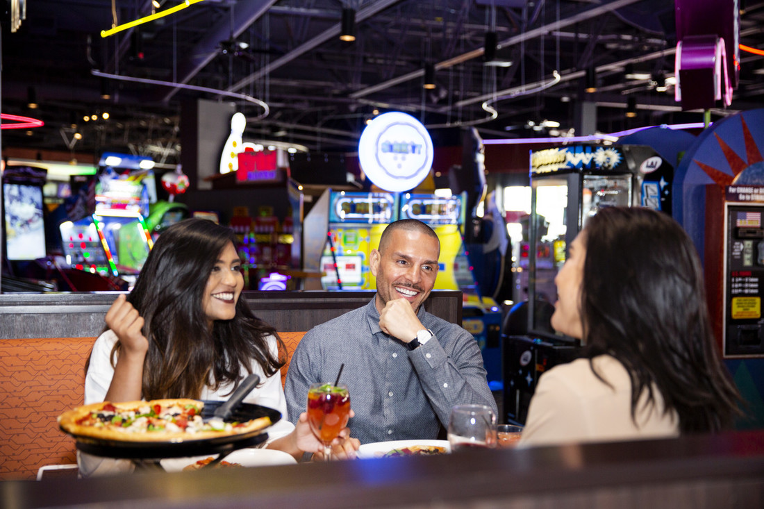 Boston Pizza Dining Booth with Hipsters Drinking