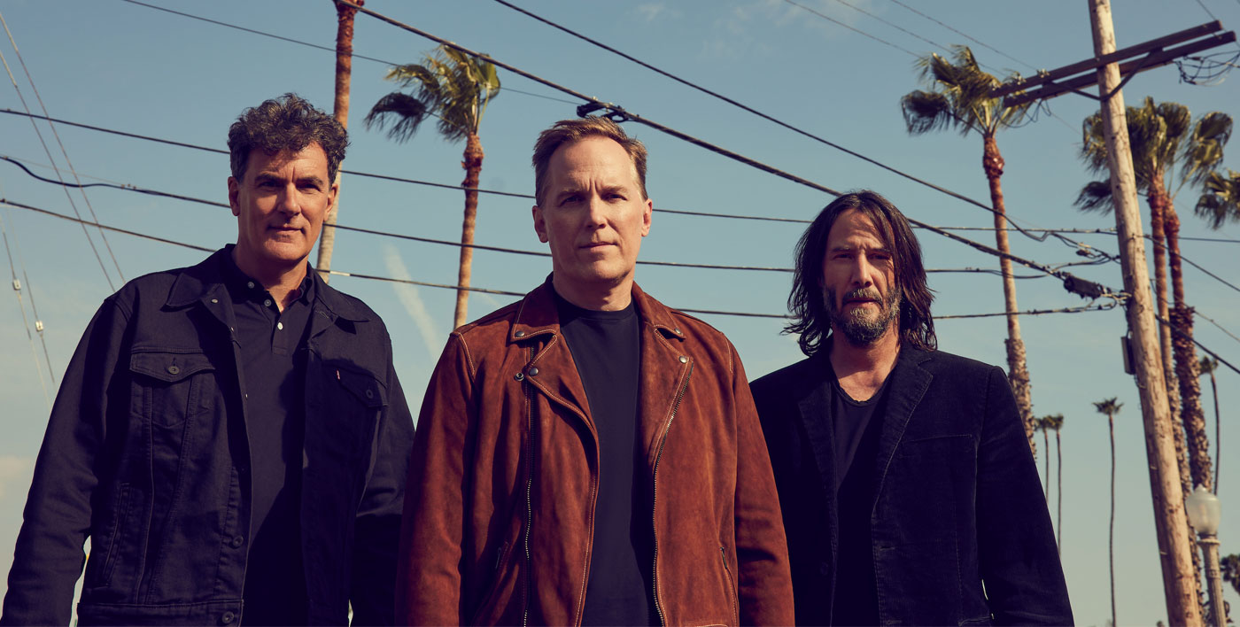 Dogstar Prom Image of Band Members with Palm Trees in Background