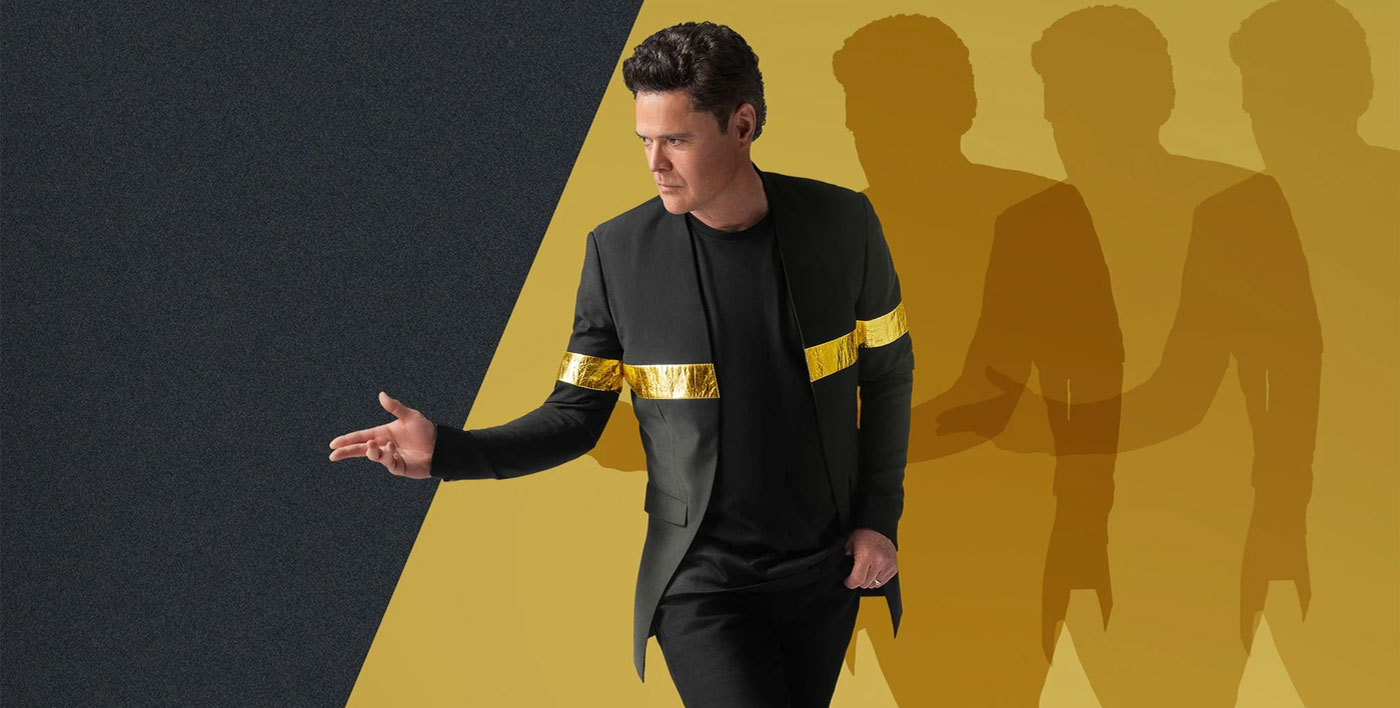 Donny Osmond in Black Suit and Gold Stripes promo image