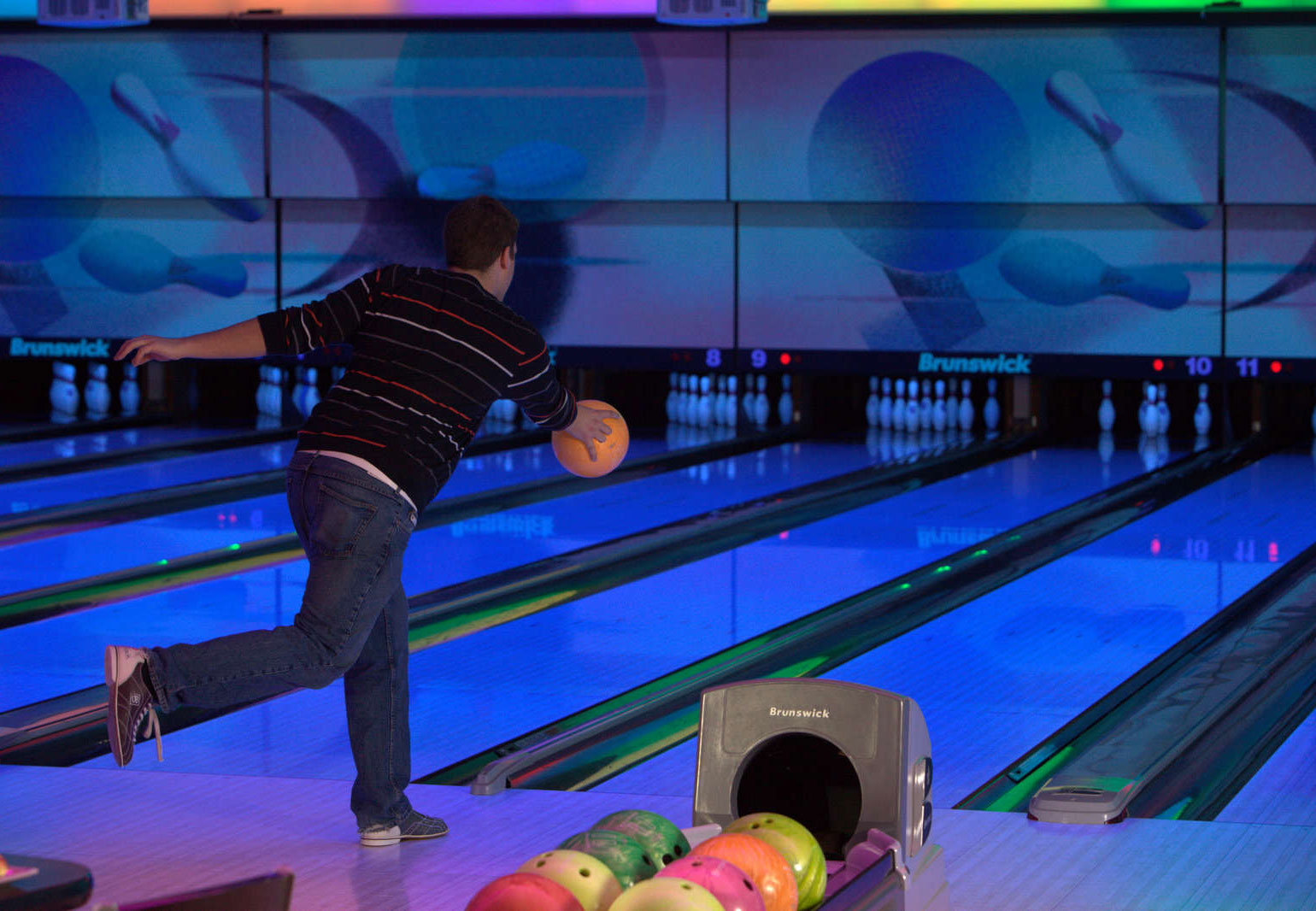 Man sends ball down lane