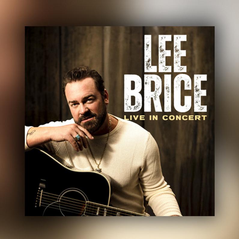 Lee Brice sitting with a guitar in his hand