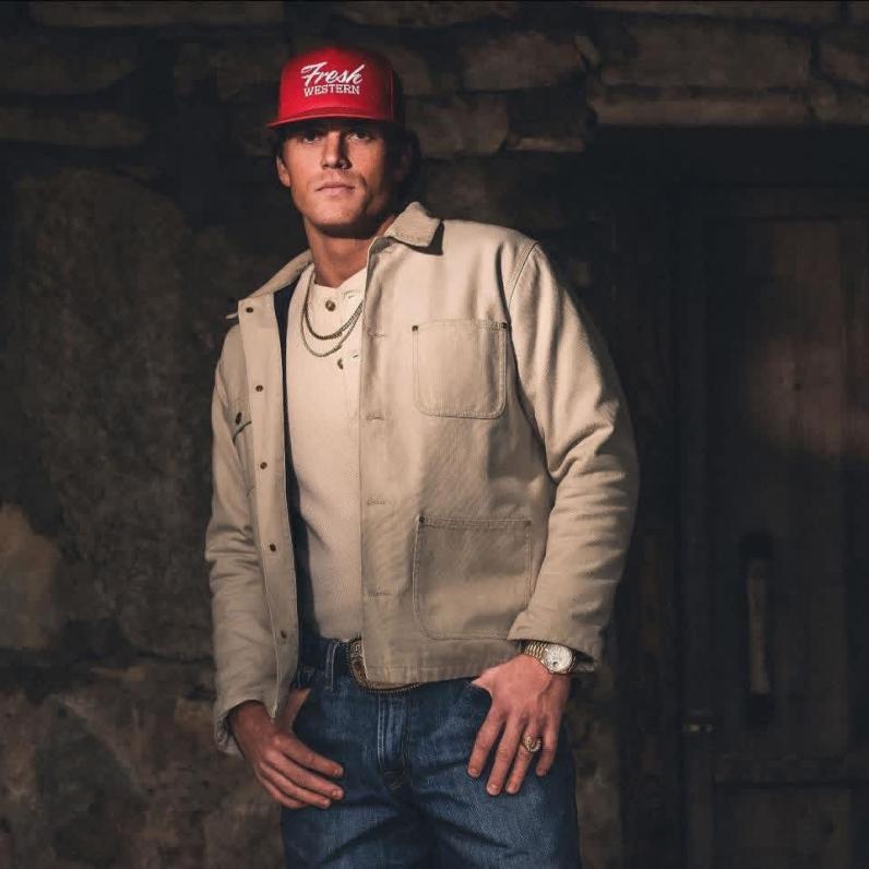 Parker McCollum in a red hat