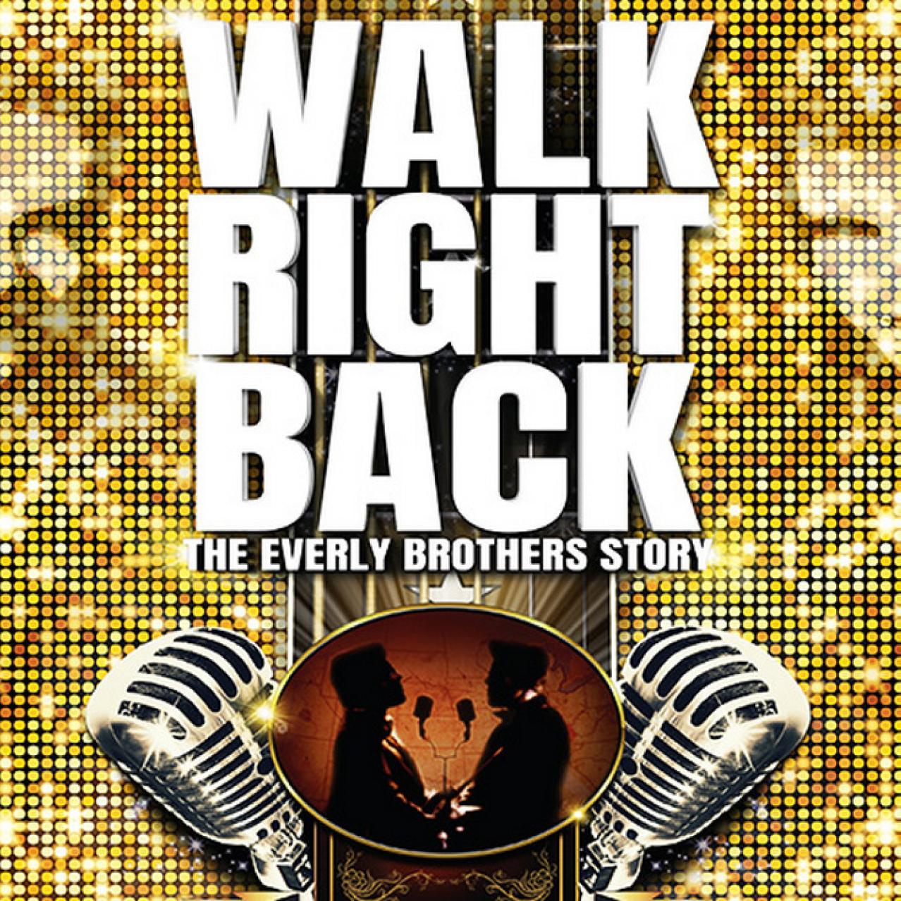 Big white letters with a golden backdrop and two microphones with the silhouette of 2 singers in the centre