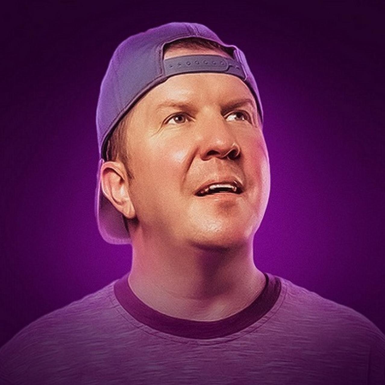 Nick Swardson wearing a backwards cap