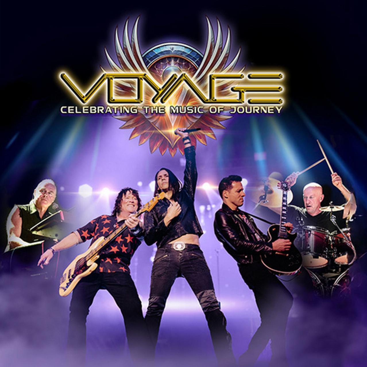 Voyage band members performing on stage with band logo above their heads