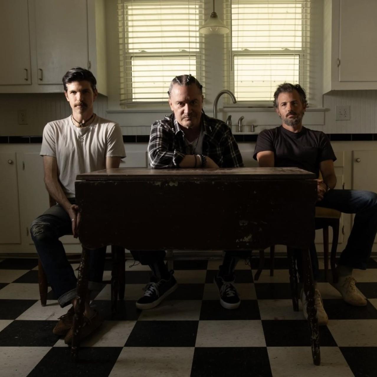 The Avett Brothers sitting with Mike Patton