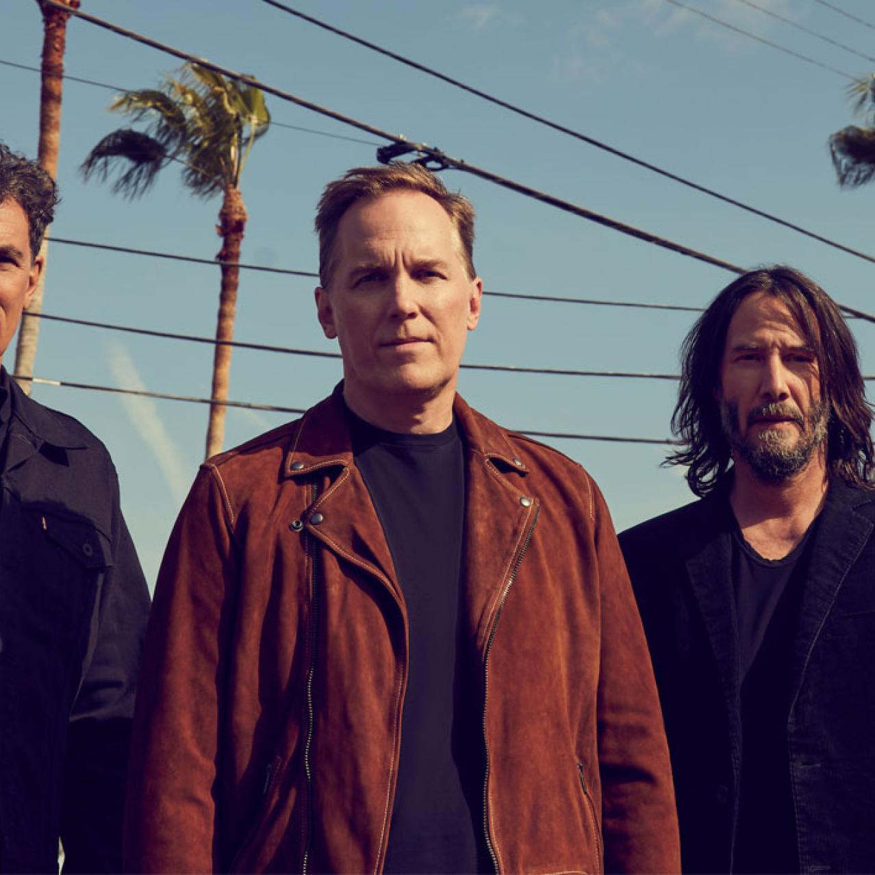 Dogstar Prom Image of Band Members with Palm Trees in Background