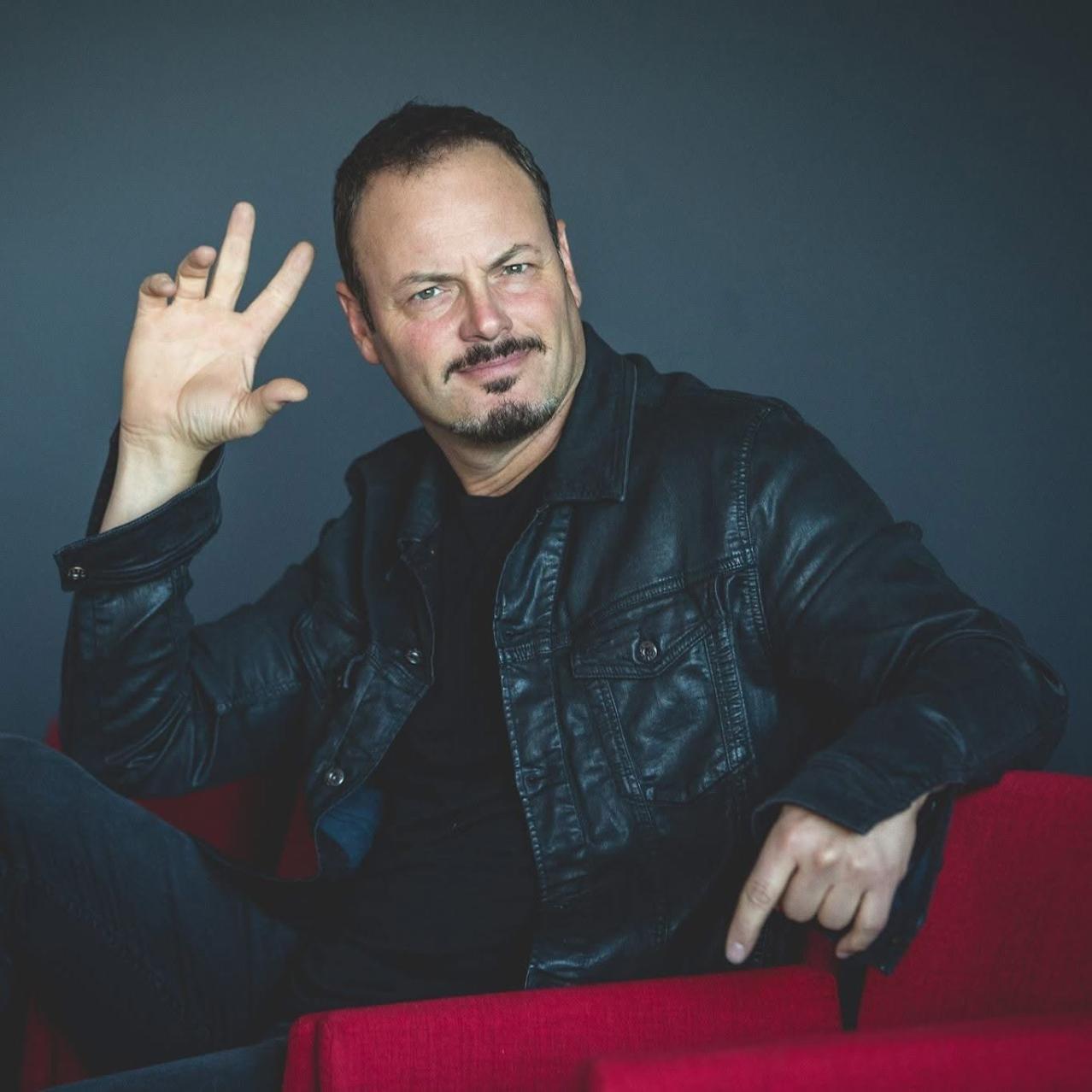Frank Spadone close up in a black leather jacket