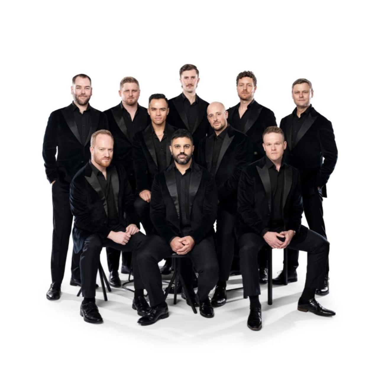 Group of Ten vocalists all dressed in black