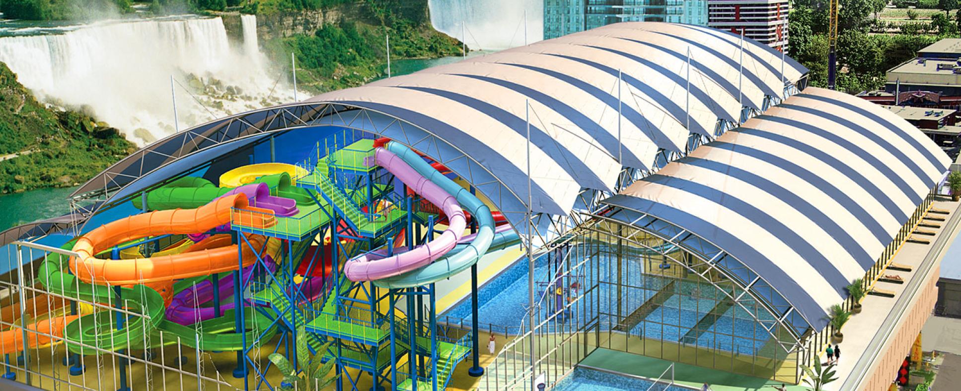 Fallsview Indoor Waterpark Exterior showcasing multiple coloured slides with the Falls and Casino in the background