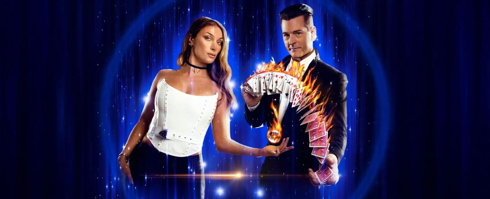 Wild Magic promo poster for Greg Frewin Theatre featuring a woman with a levitating glass ball and a man with a flaming deck of cards he is passing from one hand to the other